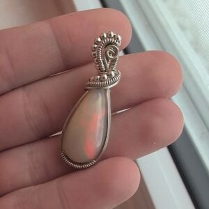 Elegant Silver and Opal Pendant